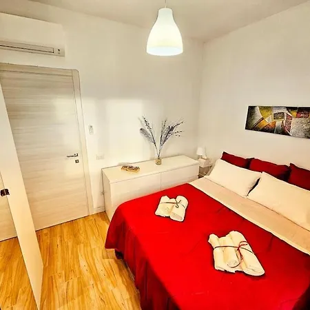 A Pirri, Via E. Toti. Cagliari. Rosas Rooms. *